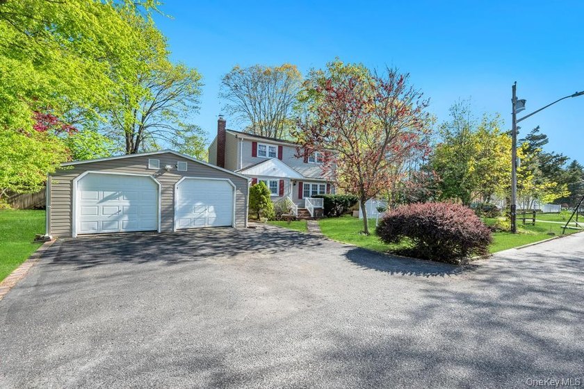 Welcome to this beautifully renovated 6-bedroom, 2-bath Colonial - Beach Home for sale in Mastic Beach, New York on Beachhouse.com
