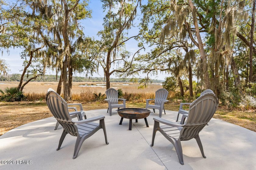 Set on three private acres with peaceful water views, this - Beach Home for sale in Seabrook, South Carolina on Beachhouse.com