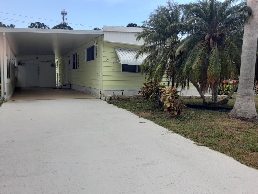 Nicely maintained unit which backs to canal.  Florida rooms have - Beach Home for sale in Port Saint Lucie, Florida on Beachhouse.com