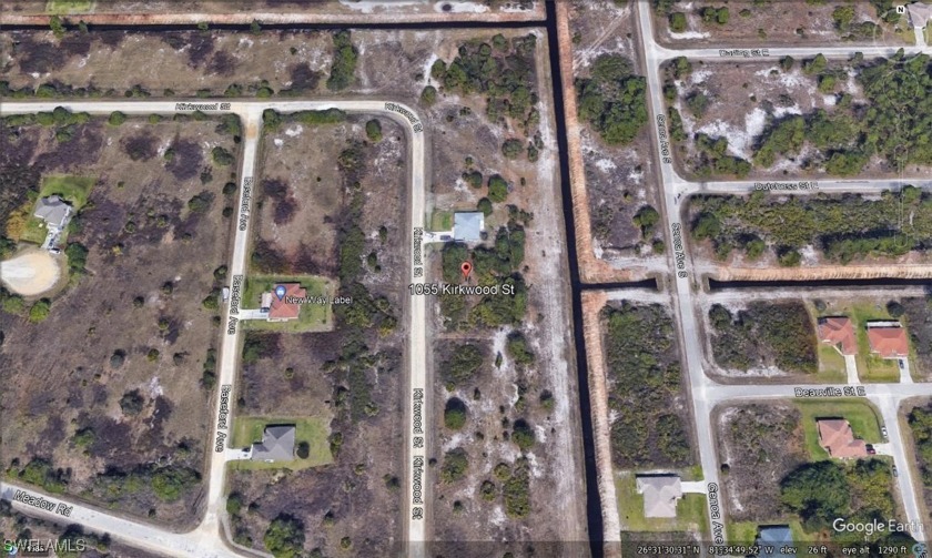 VERY NICE LEHIGH LOT ** ON A SMALL CANAL LOCATED ** WE HAVE TWO - Beach Lot for sale in Lehigh Acres, Florida on Beachhouse.com