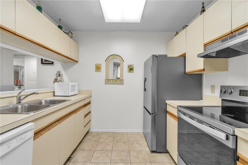 Welcome home to this furnished, turnkey FIRST-FLOOR END UNIT - Beach Condo for sale in Vero Beach, Florida on Beachhouse.com