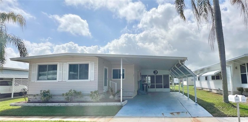 Welcome to this thoughtfully refreshed 2-bedroom, 2-bath - Beach Home for sale in Largo, Florida on Beachhouse.com