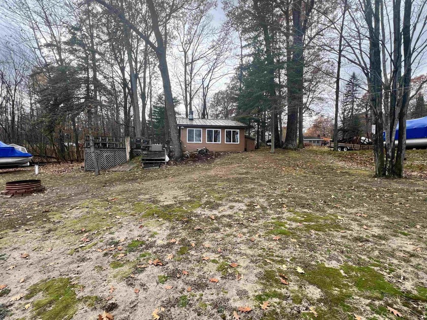 Cranberry Lake canal-front serenity awaits at this comfortable - Beach Home for sale in Harrison, Michigan on Beachhouse.com