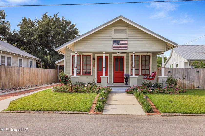 This pristine cottage has great curb appeal with its beckoning - Beach Home for sale in Bay Saint Louis, Mississippi on Beachhouse.com