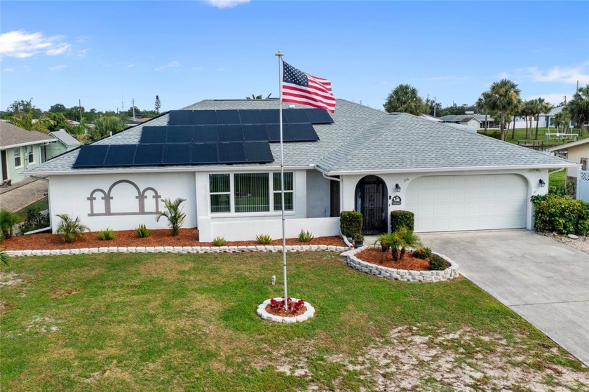 PRIME WATERFRONT LOCATION! THIS HOME IS JUST 1 BRIDGE AND 20 - Beach Home for sale in Port Charlotte, Florida on Beachhouse.com