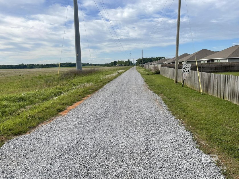 Follow this gravel road to your slice of paradise!!! Fenced and - Beach Acreage for sale in Foley, Alabama on Beachhouse.com