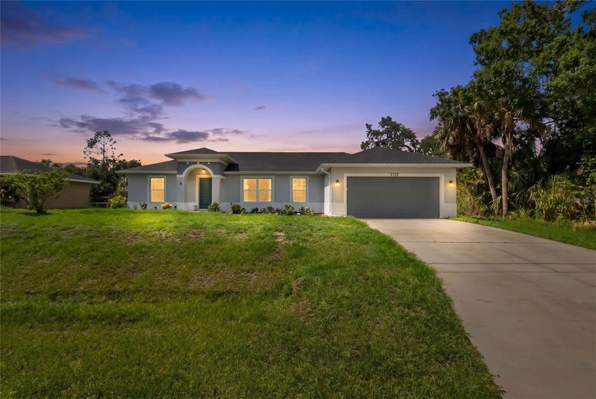 This 2023 built home Spans 1,574 sqft and features an open - Beach Home for sale in North Port, Florida on Beachhouse.com