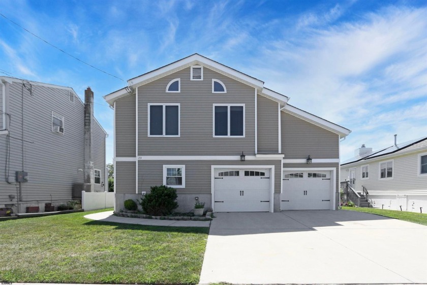 Nestled along the lush greens of a Brigantine Golf Links, this - Beach Home for sale in Brigantine, New Jersey on Beachhouse.com