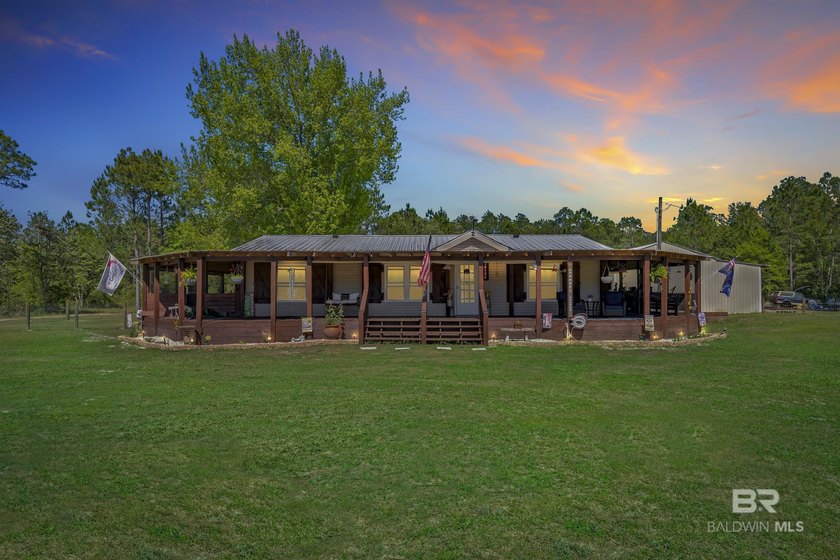 Escape to your own private paradise on 27+- acres along - Beach Home for sale in Lillian, Alabama on Beachhouse.com