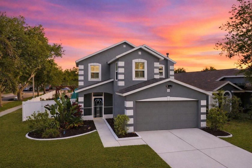 Welcome home to this inviting, 3-bed + loft pool-home on a - Beach Home for sale in Apollo Beach, Florida on Beachhouse.com