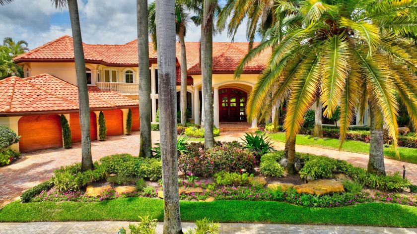 Incredible WATER & GOLF VIEWS in St. Andrews CC! Located on an - Beach Home for sale in Boca Raton, Florida on Beachhouse.com