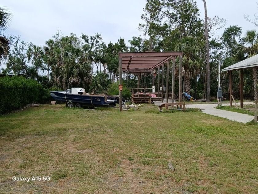 Waterfront lot with hoist capable of lifting large boats - Beach Lot for sale in Suwannee, Florida on Beachhouse.com