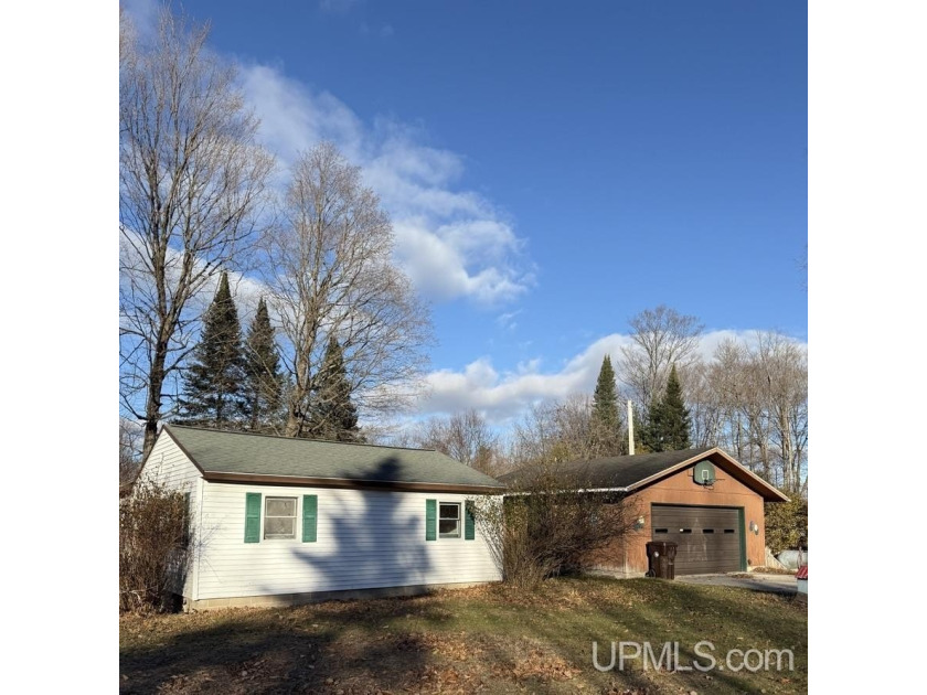 Attention Investors! Solid little home on a private road, where - Beach Home for sale in Manistique, Michigan on Beachhouse.com