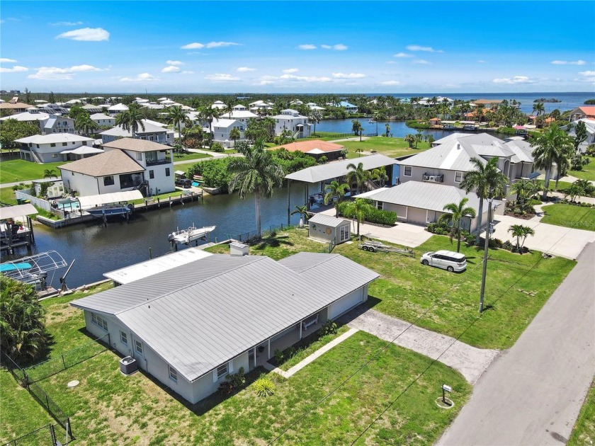 LOCATION! LOCATION! LOCATED IN PIRATE HARBOR WHERE THE FISHING & - Beach Home for sale in Punta Gorda, Florida on Beachhouse.com