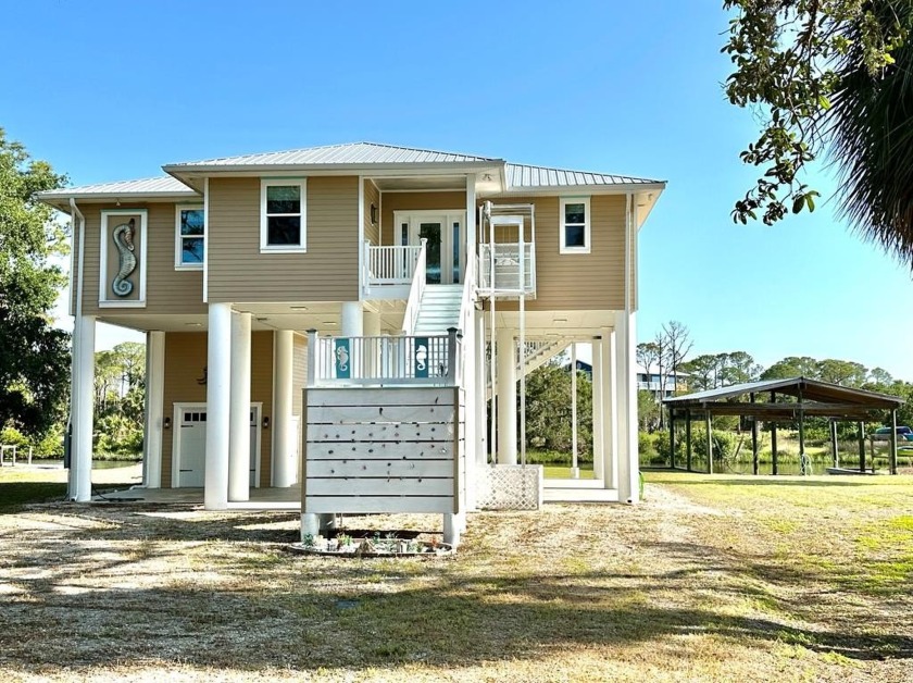 Gorgeous, water front and nearly new, this two-bedroom, two-bath - Beach Home for sale in Cedar Key, Florida on Beachhouse.com