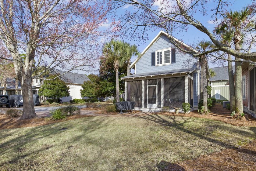 Set on a prime corner lot within the Bungalos at Sandestin, this - Beach Home for sale in Miramar Beach, Florida on Beachhouse.com