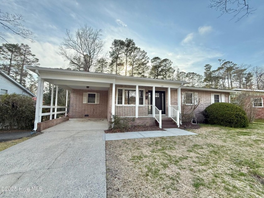 Discover this beautifully renovated brick home in the heart of - Beach Home for sale in Havelock, North Carolina on Beachhouse.com
