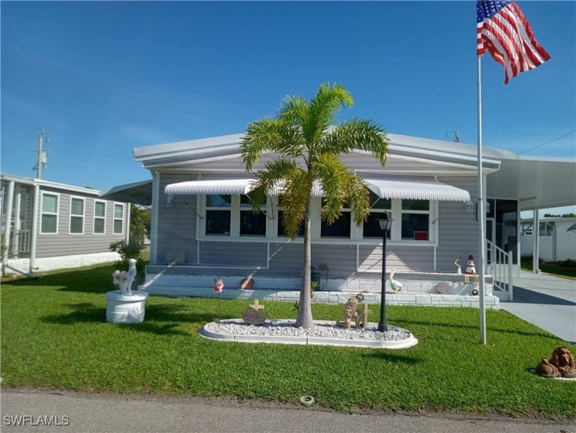 BEAUTIFULLY MAINTAINED, this large, 2 bedroom, 2 bath home with - Beach Home for sale in North Fort Myers, Florida on Beachhouse.com