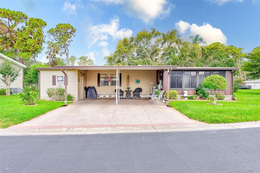 Tucked away on a quiet street within the sought-after Glenwood - Beach Home for sale in Largo, Florida on Beachhouse.com