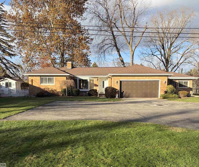 Harrison Twp. brick ranch sitting on 1.28 acres on the RIVER!! - Beach Home for sale in Harrison, Michigan on Beachhouse.com