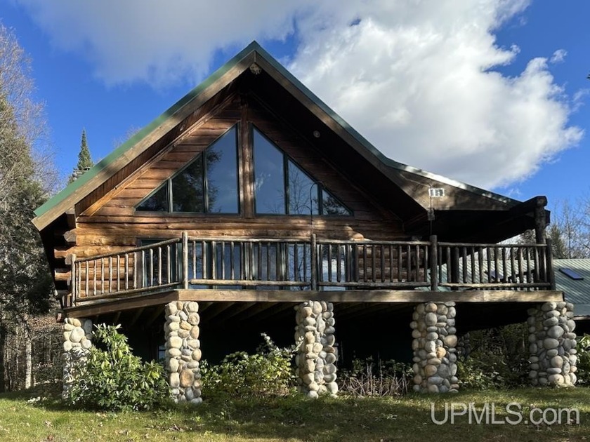 Log Cabin Lakefront retreat on 10 Acres! Perfect location for - Beach Apartment for sale in Grand Marais, Michigan on Beachhouse.com