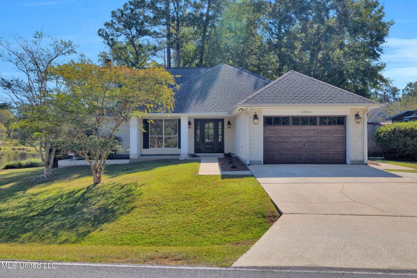 This isn't just a house; it's a lakeside retreat! This - Beach Home for sale in Diamondhead, Mississippi on Beachhouse.com