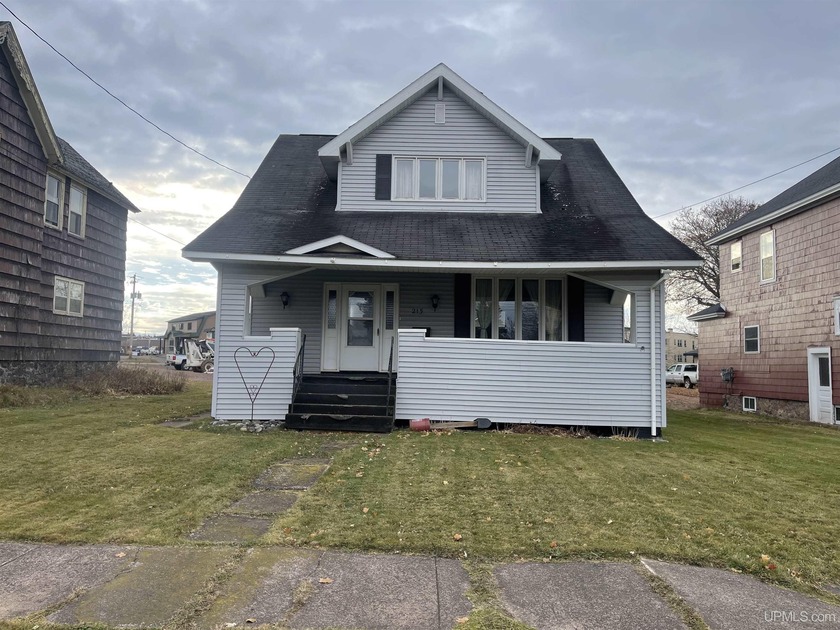 Character-filled 3 bedroom, 1 bath home featuring a 2- car - Beach Home for sale in Ironwood, Michigan on Beachhouse.com