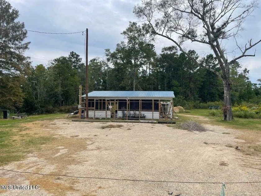 Set on 1.7 acres including 180 ft of navigable waterfront - Beach Lot for sale in Pearlington, Mississippi on Beachhouse.com