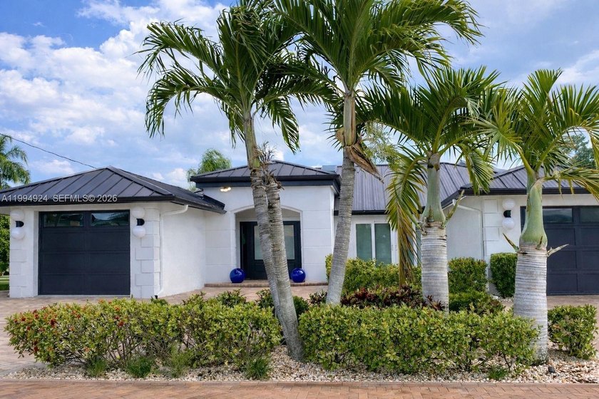 Experience elevated waterfront living in this beautifully - Beach Home for sale in Cape Coral, Florida on Beachhouse.com