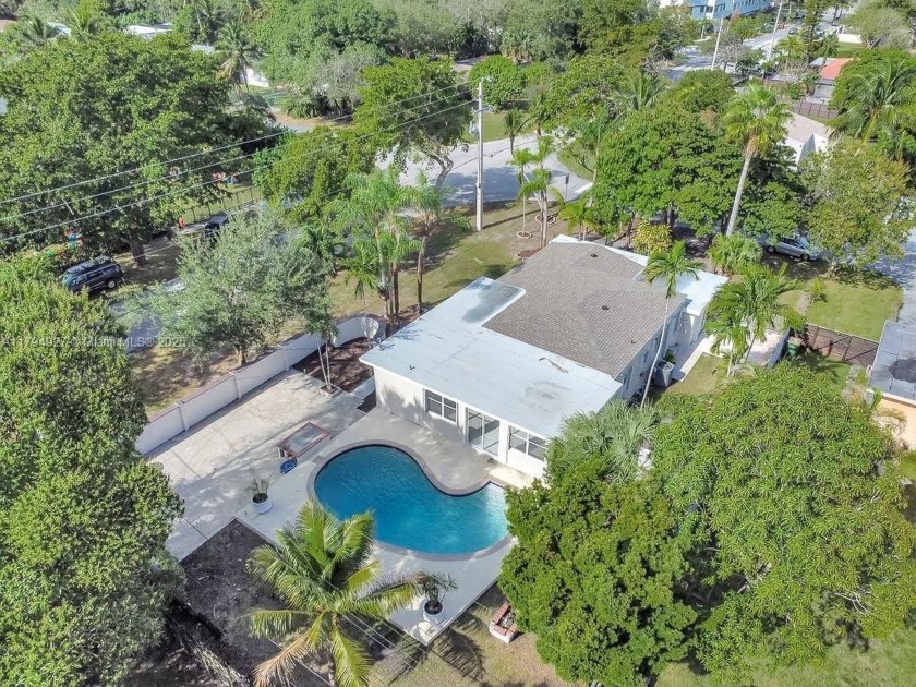 Spacious and updated 3-bed, 3-bath home on a large corner lot in - Beach Home for sale in North Miami, Florida on Beachhouse.com