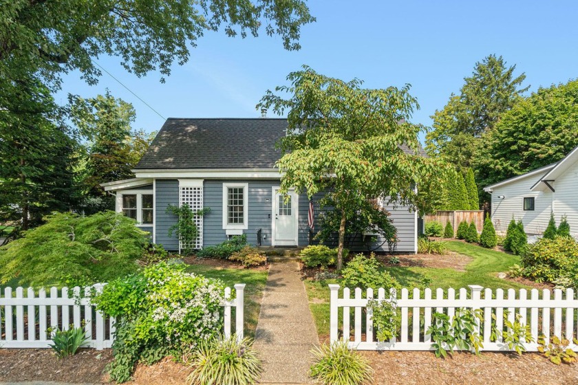 Discover this beautifully updated 3-bedroom, 3-bathroom property - Beach Home for sale in Saugatuck, Michigan on Beachhouse.com