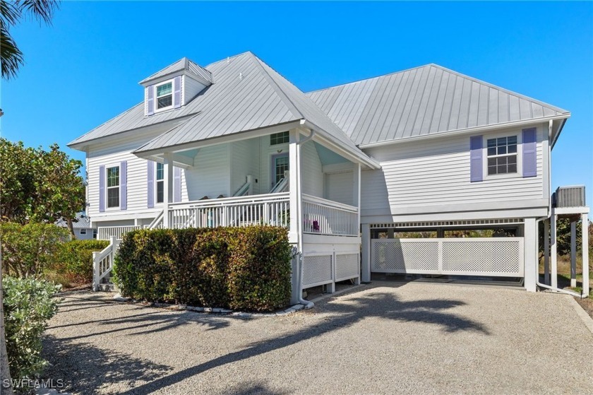 Exceptional elevated home with open floor plan and preserve - Beach Home for sale in Sanibel, Florida on Beachhouse.com