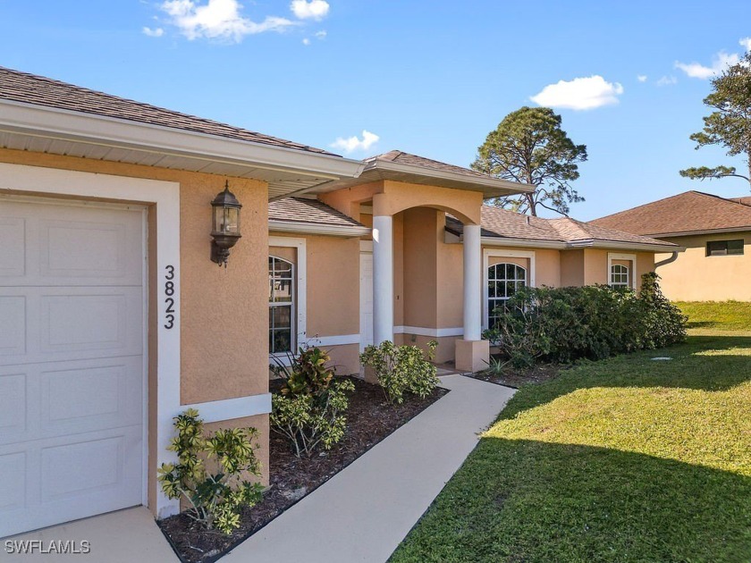 CANAL Home with POOL!! This 3 bedroom 2 bath home in Lehigh - Beach Home for sale in Lehigh Acres, Florida on Beachhouse.com