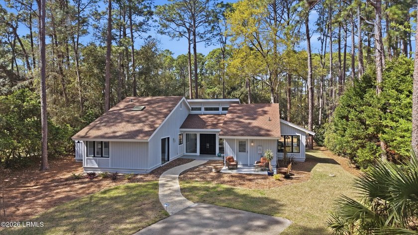 Set on a spacious golf view lot, this beautifully renovated home - Beach Home for sale in Hilton Head Island, South Carolina on Beachhouse.com