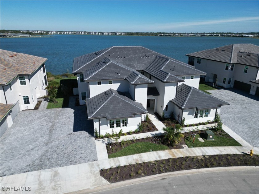 Stunning Coach Home with Lake Babcock Sunrise Views - - Beach Condo for sale in Punta Gorda, Florida on Beachhouse.com