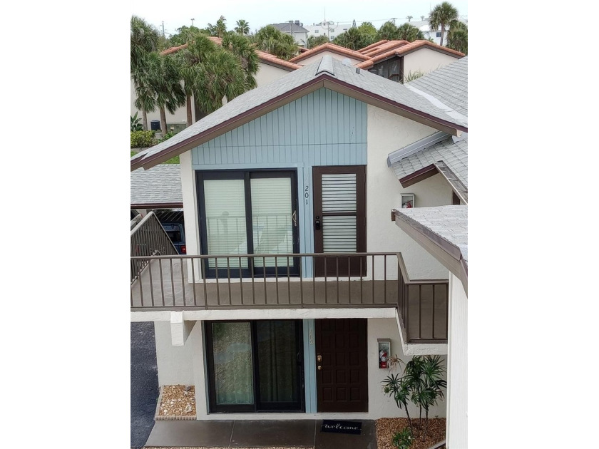 Situated on the second story of a 4 unit building within the - Beach Condo for sale in Sarasota, Florida on Beachhouse.com