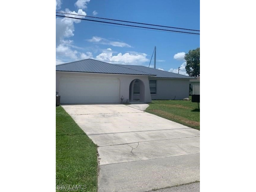 CANAL HOME IN THE HEART OF CAPE CORAL MINUTES TO THE RIVER - Beach Home for sale in Cape Coral, Florida on Beachhouse.com