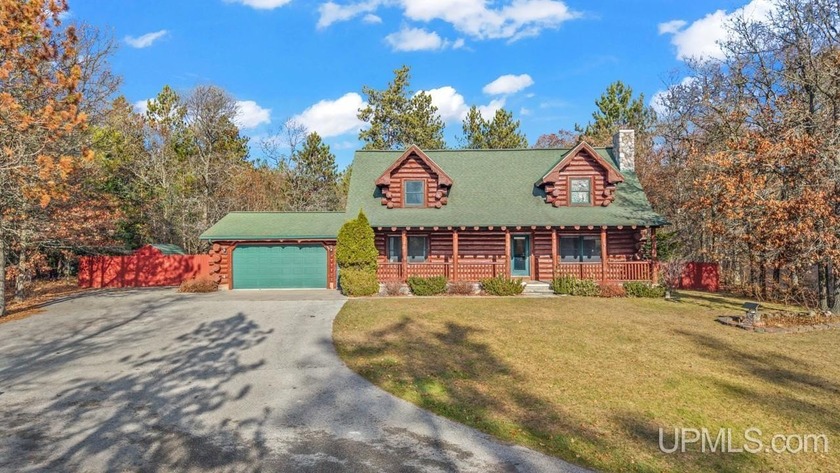 Beautiful custom-built log home situated on just over half an - Beach Home for sale in Rapid River, Michigan on Beachhouse.com