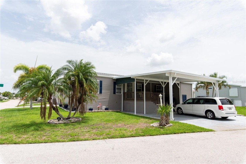 Located in the desirable 55+ community of Windmill Village, this - Beach Home for sale in Punta Gorda, Florida on Beachhouse.com