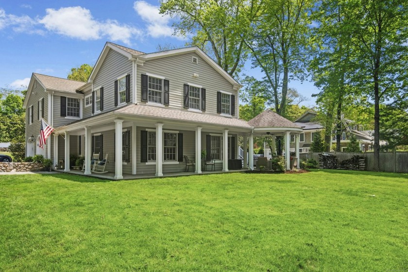 Welcome to this inviting four-bedroom home perfectly situated on - Beach Home for sale in Darien, Connecticut on Beachhouse.com