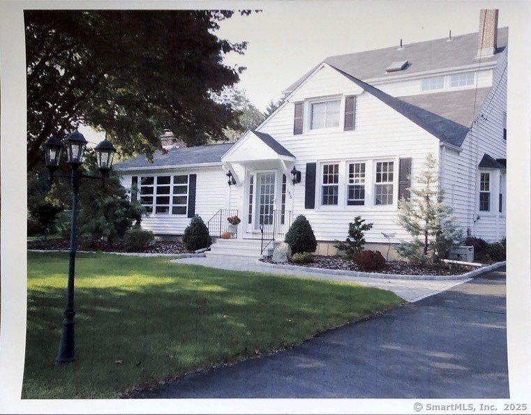 Charming Cape Home with Endless Potential! Step into this - Beach Home for sale in Orange, Connecticut on Beachhouse.com