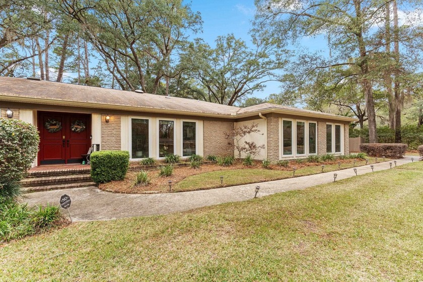 Located in the beautiful Killearn Estates, this four-bedroom - Beach Home for sale in Tallahassee, Florida on Beachhouse.com