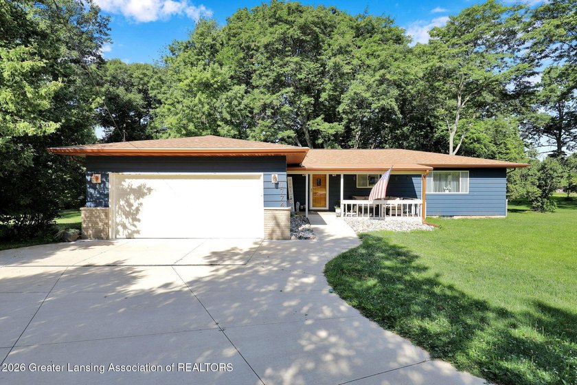 Step into elevated living with this beautifully reimagined - Beach Home for sale in Williamston, Michigan on Beachhouse.com