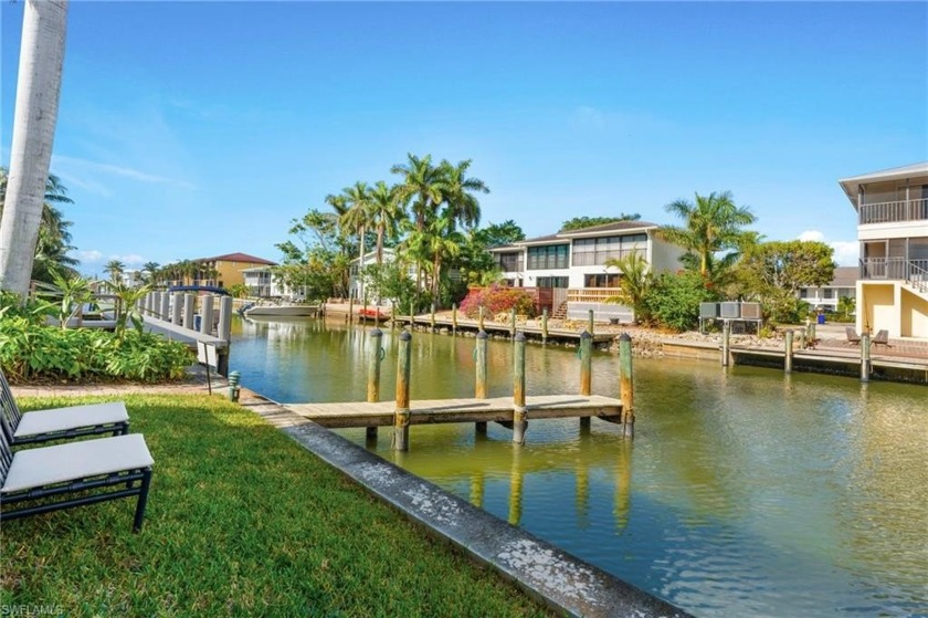 RENOVATED WATERFRONT UNIT WITH DIRECT GULF ACCESS! Nestled on a - Beach Home for sale in Naples, Florida on Beachhouse.com