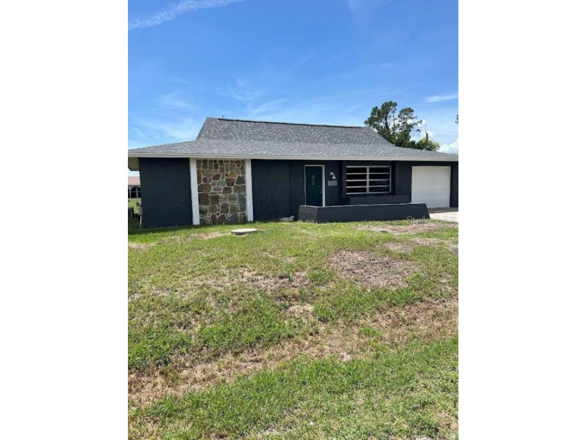 Affordable fixer-upper offering spacious bedrooms, two full - Beach Home for sale in Port Charlotte, Florida on Beachhouse.com