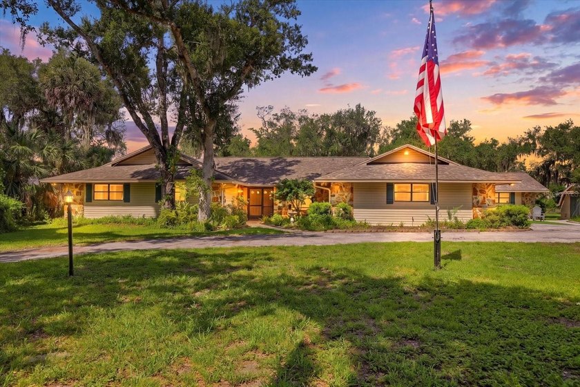 Welcome to 5850 Vanderipe Road, a spacious home set on 6.5 - Beach Home for sale in Sarasota, Florida on Beachhouse.com