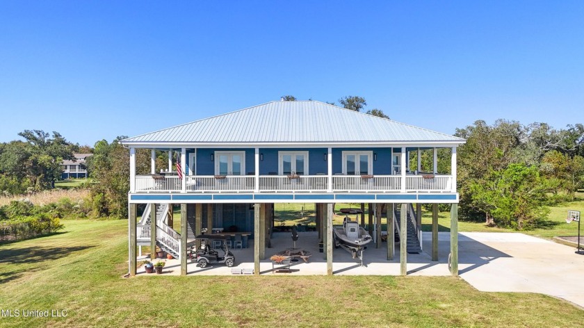 Enjoy breathtaking views and easy access to the beach, making - Beach Home for sale in Waveland, Mississippi on Beachhouse.com