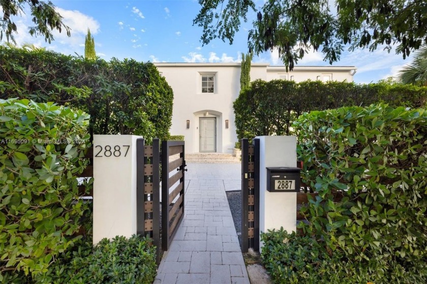 This opulent Miami Beach estate offers a perfect fusion of - Beach Home for sale in Miami Beach, Florida on Beachhouse.com