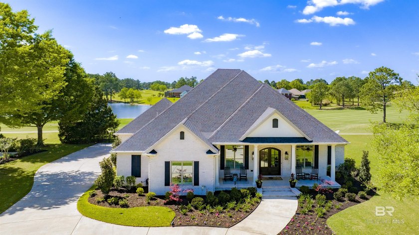 Set along the 16th fairway in the sought-after Glen Lakes Golf - Beach Home for sale in Foley, Alabama on Beachhouse.com