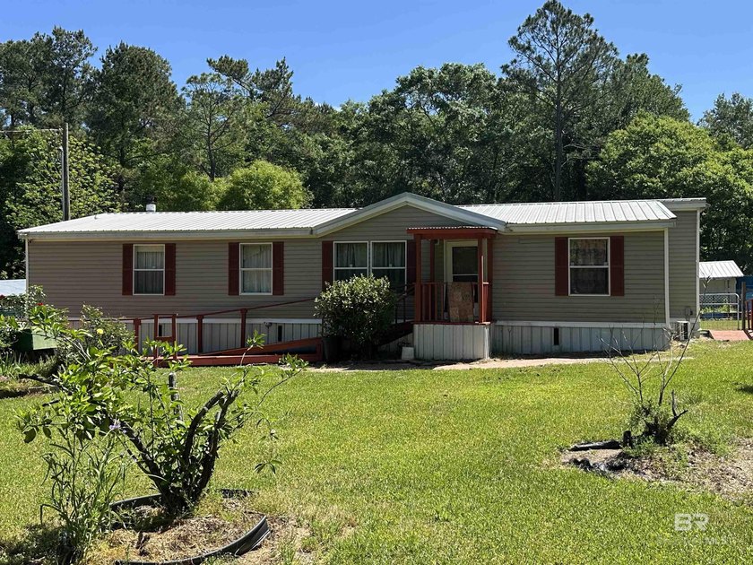 Three-bedroom, two bath Mobile home sitting on 1 acre, level - Beach Home for sale in Robertsdale, Alabama on Beachhouse.com